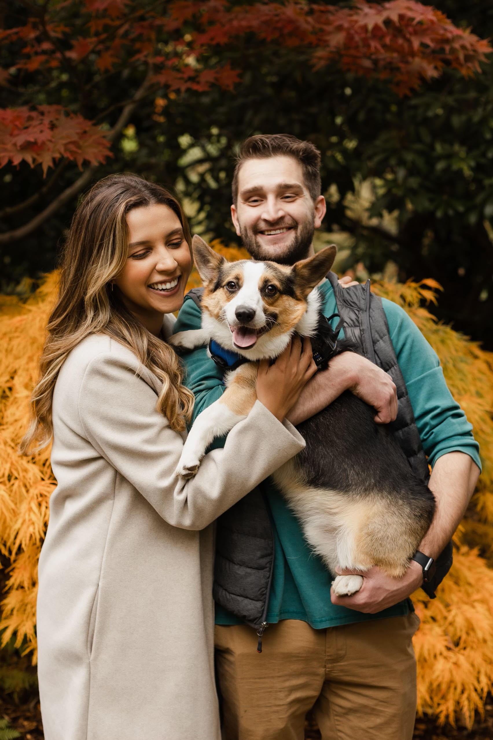 Nick Crandell with his wife and corgi